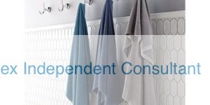 Norwex bath towels hanging up in a bathroom