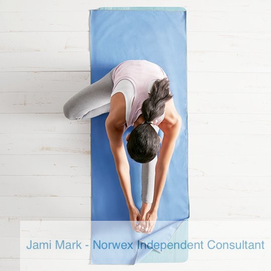 Woman using the Large Norwex Sports Towel for yoga