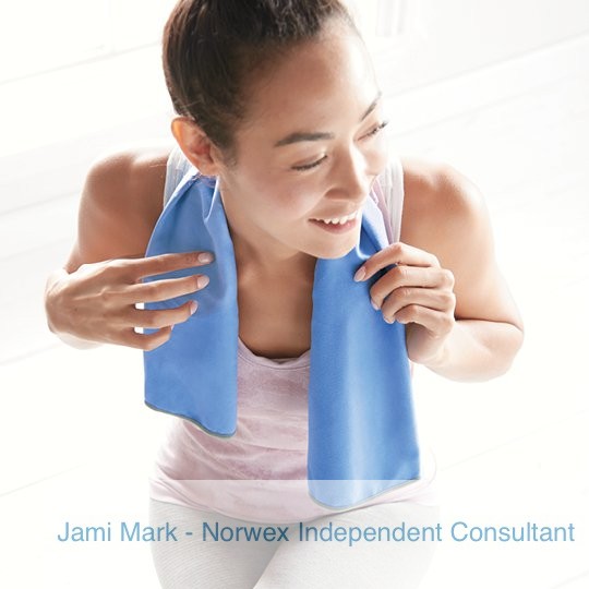 Woman after workout with the Small Norwex Sports Towel around her neck