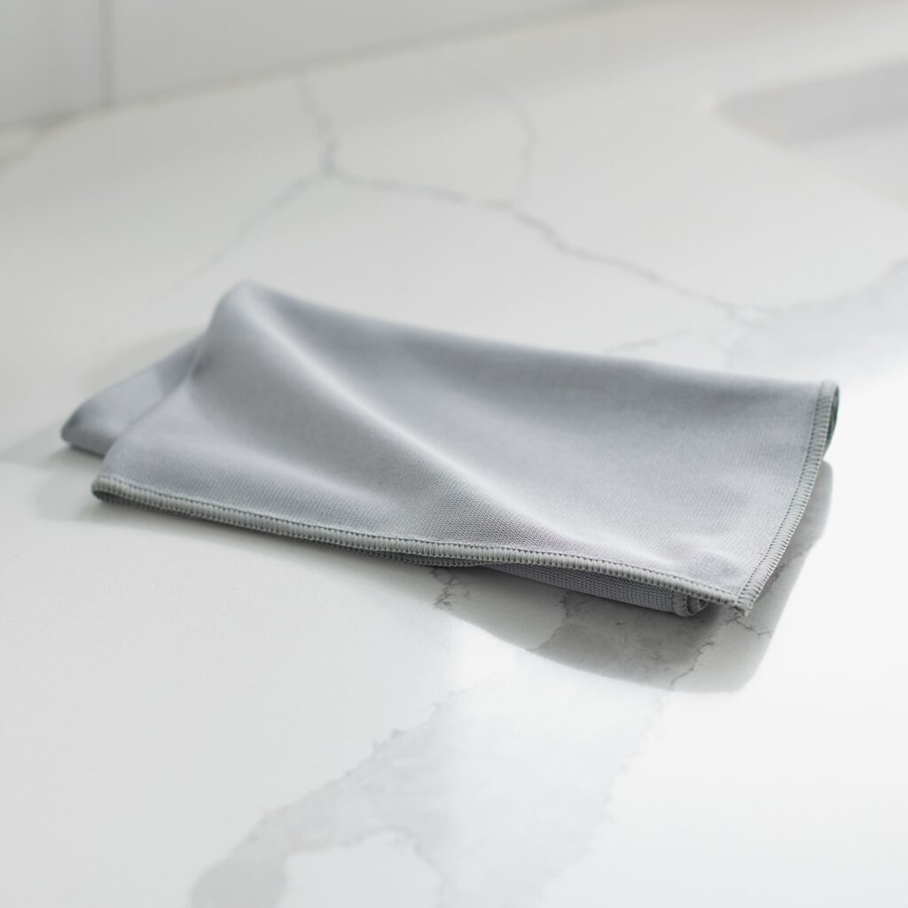 Gray Norwex Window Cloth on a counter